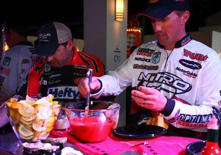 Edwin Evers and Mike McClelland load up on oysters, gumbo and shrimp.