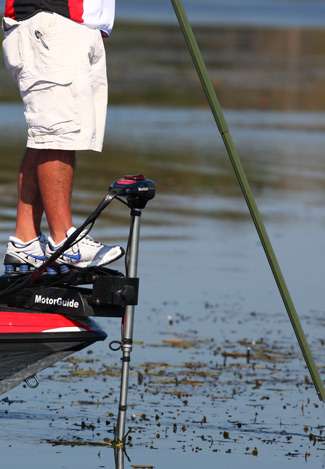 Scott Rook takes a perch on his trolling motor bracket.
