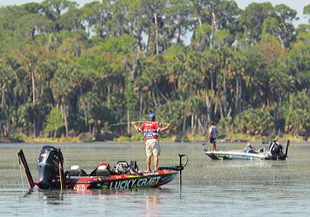 Kelly Jordon rests his rod on his shoulders, seemingly in repose asking where are the fish today?