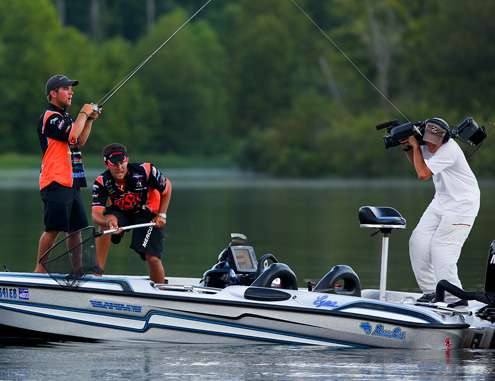 Flurry looks on in shock, and Birge screams a warning but it was too late. Miller is struck by the bait. 