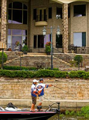 The Auburn team fishes a point in front of the many large homes on Hurricane Lake. 