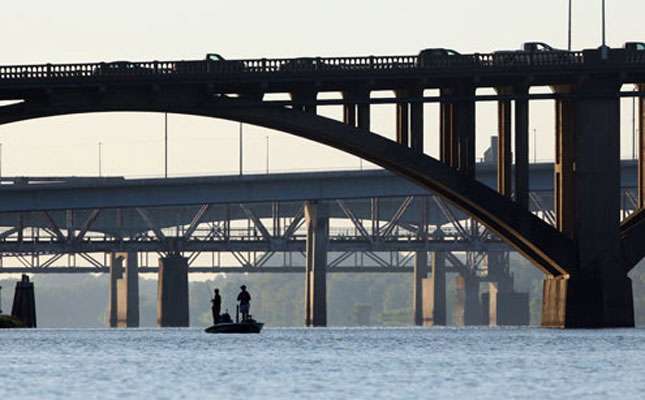 Competitors on the Arkansas River began Day One long before commuters began making their way into Little Rock. 
