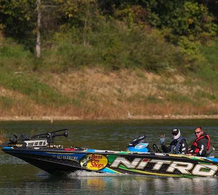 <p>
Ott DeFoe heads into a creek on Day One. </p>