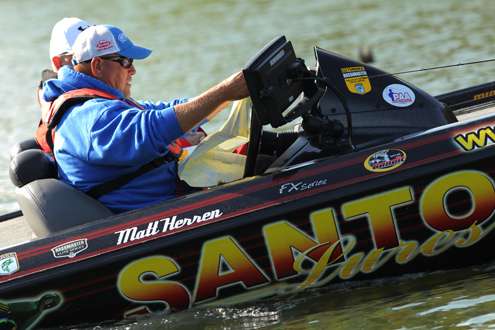 <p>
Herren checks his map for another spot.</p>