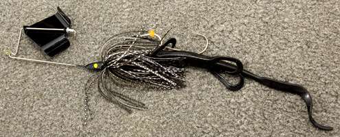 <p>Kleinâs outrageous buzzbait rig consists of a 1/2-ounce Lunker Lure with a black blade and a dark custom skirt, a trailer hook and a black lizard. He throws this when he has big bass in mind.</p>
