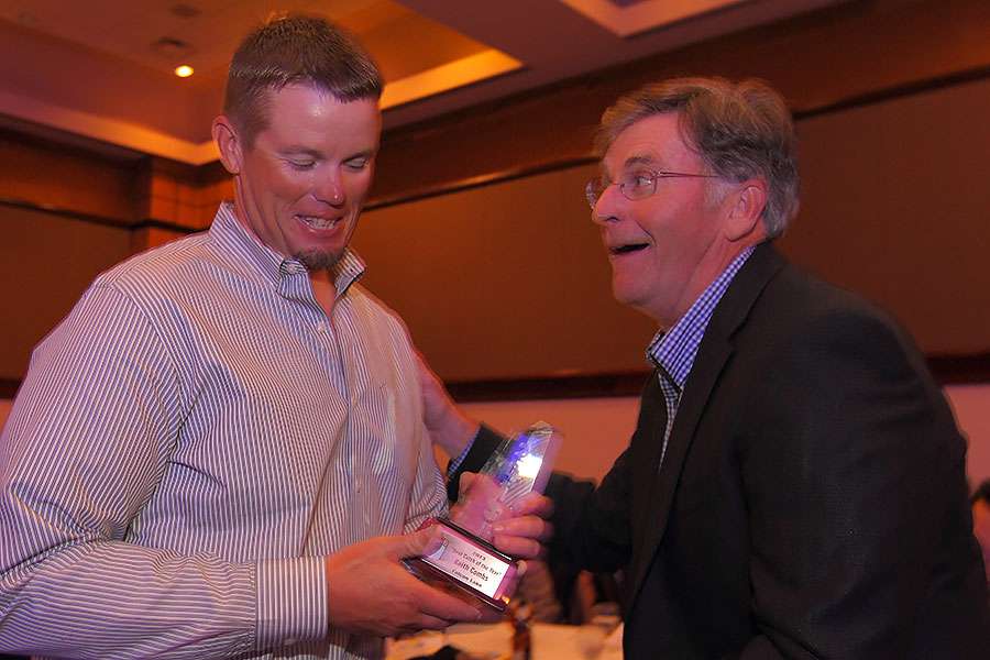 Tommy Sanders, right, presented the Best Catch of the Year award to Keith Combs.