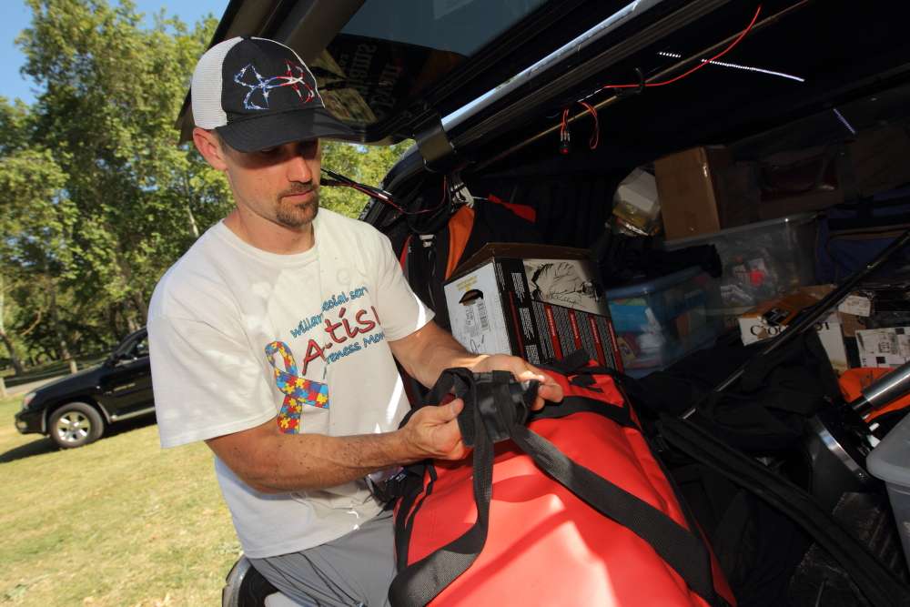 Bags and boxes are his preferred method of organizing his cargo area.