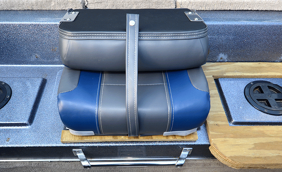 Hereâs the middle seat in place on the cooler with the plywood supports. Next I sealed the plywood supports and bases with exterior paint and covered them with the same carpet I used to re-carpet the rest of the boat.