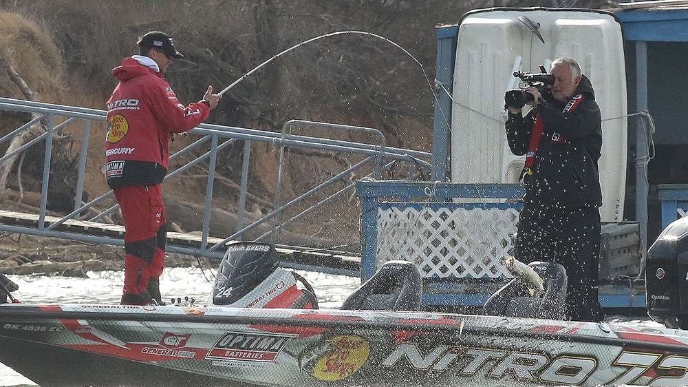 Next he pops a small one in the boat.