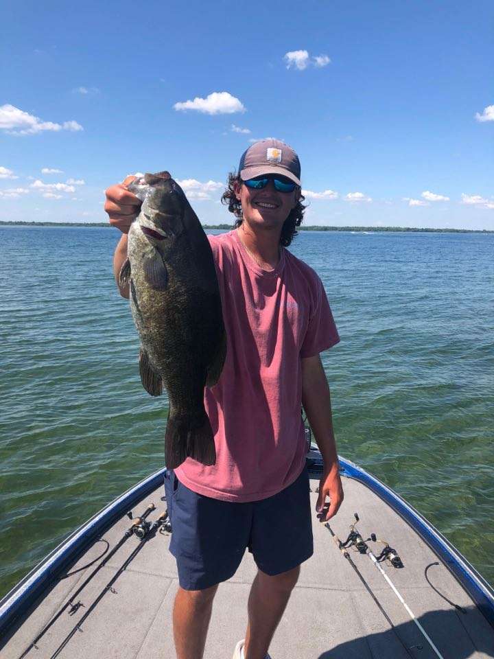 Rob Cruvellier with a giant brown fish.
<p>
Cruvellier lives in Montreal, Quebec, and has a camp in Alburgh, Vt., on Lake Champlain. The boys explored Champlain for a few days and then ventured to the St. Lawrence for the bass opener. âChase and I had 19.5-pounds on Champlain before cranking up the big motor. We were waiting on the bass opener on the St. Lawrence so that we could go hunting for some really big ones. I think itâs easier to catch numbers on Champlain but the size of fish on the St. Lawrence is unmatched.â
