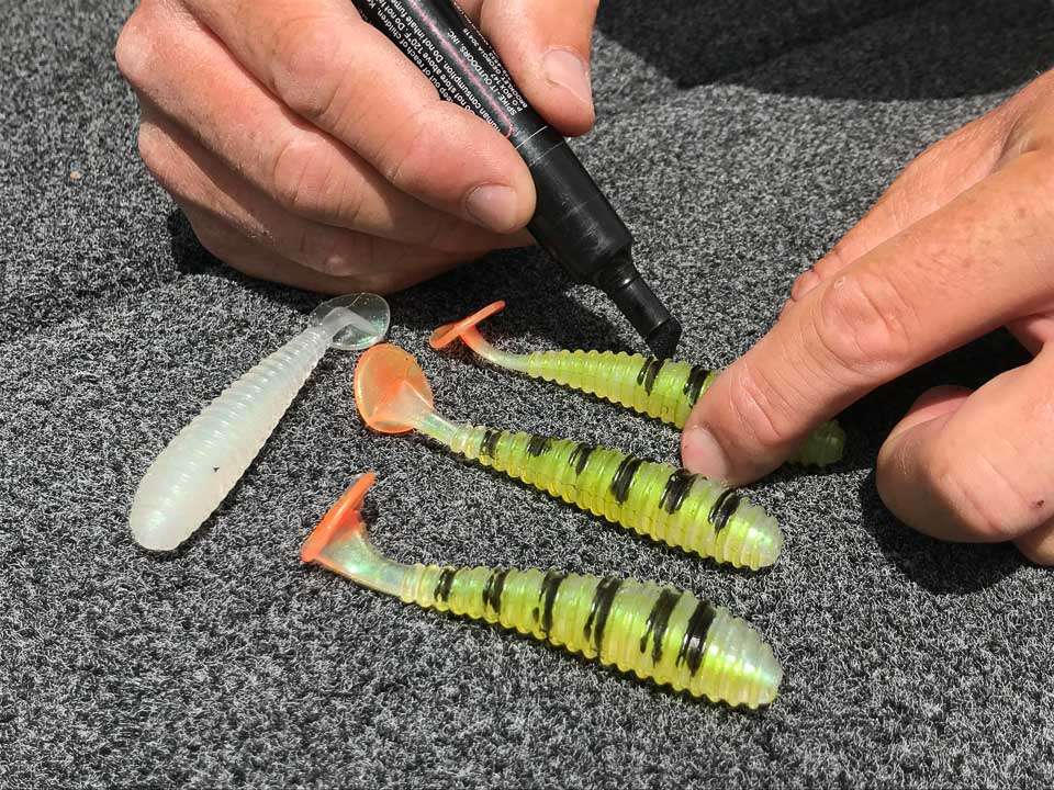 <b>Ripper Yellow Perch Swimbait.</b> One of Muellerâs signature creations is a Ripper swimbait modified to mimic a yellow perch. Starting with a translucent bait, he colors the back and sides with a chartreuse dye pen, adds orange to the tail and then lays black stripes across the back. The result is a tantalizing bait that big smallmouth cannot resist.